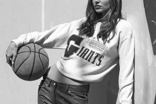 Miranda Kerr in a basket inspired outfit and headband
