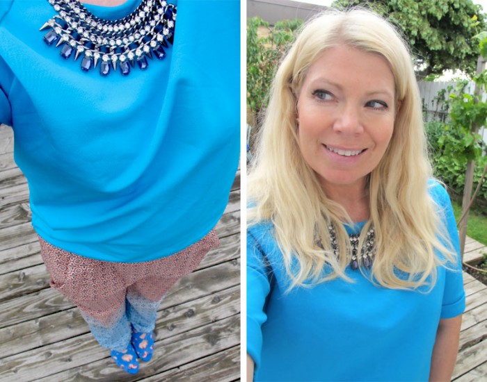 statement necklace and blue top