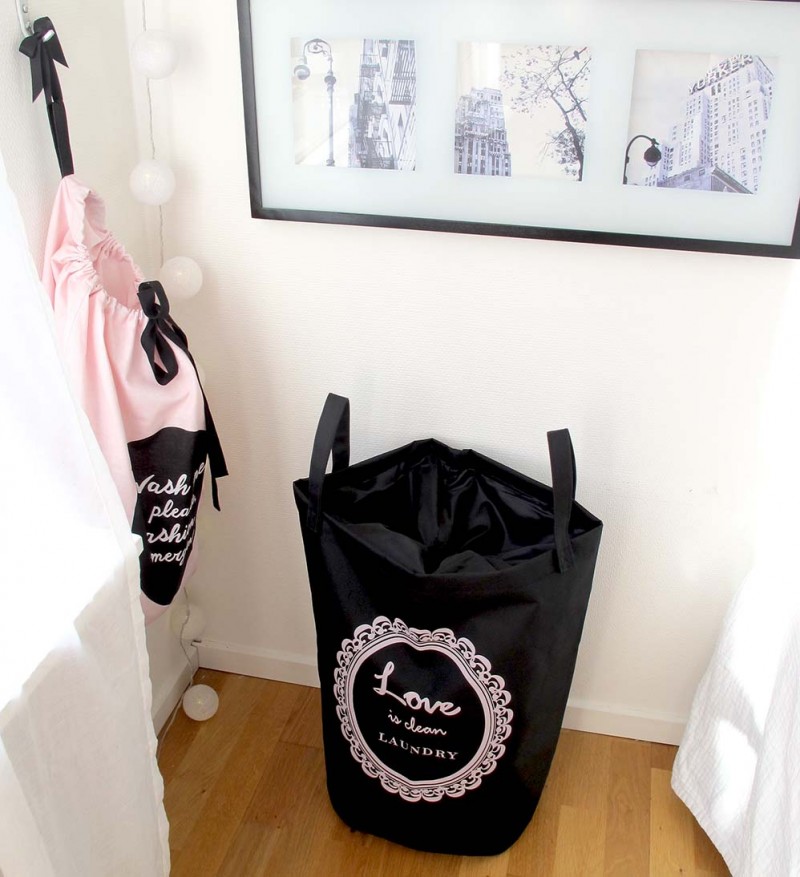 tvättkorg och tvättpåse från HM i svart och rosa